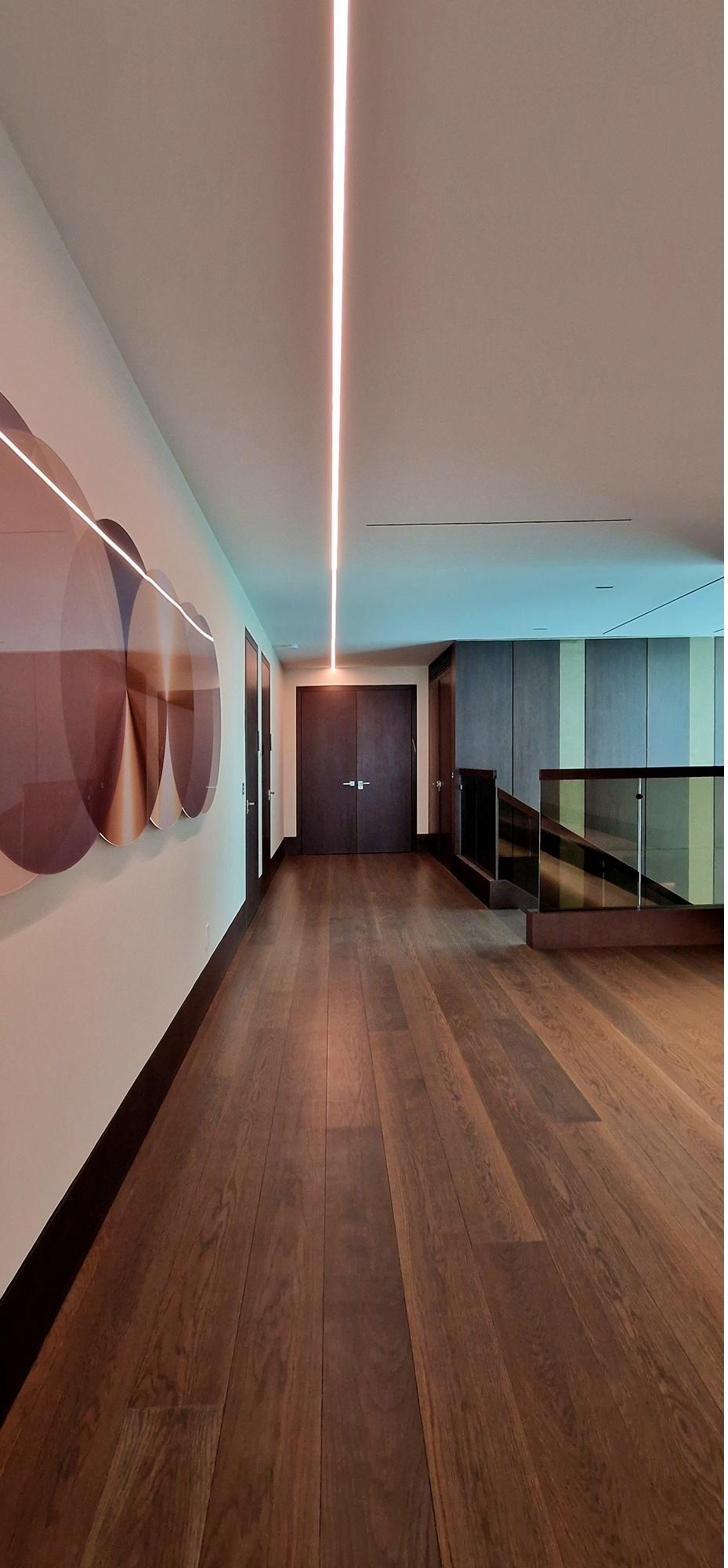 Modern hallway with linear lighting detail