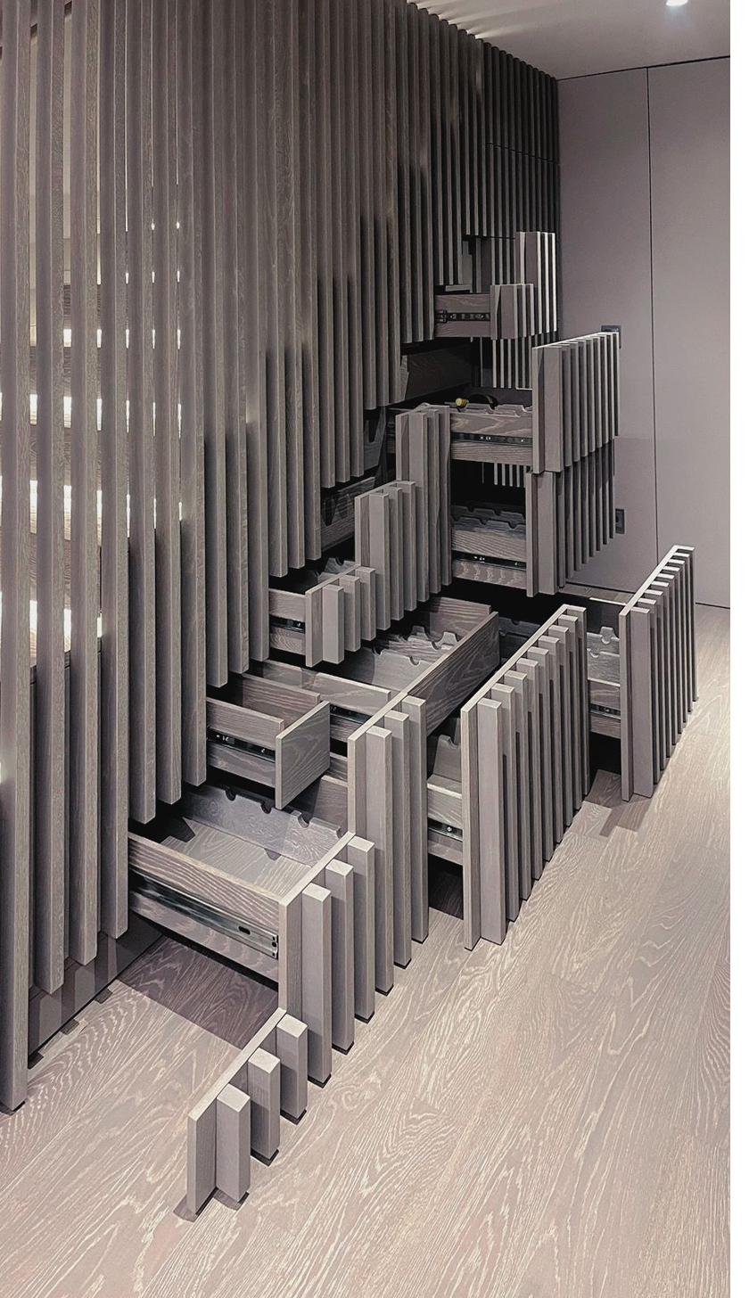 Custom wine cellar with wood and leather millwork